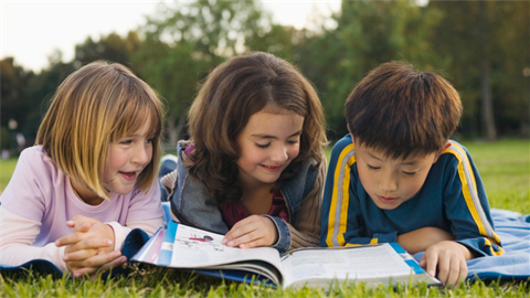 Kids reading together.png