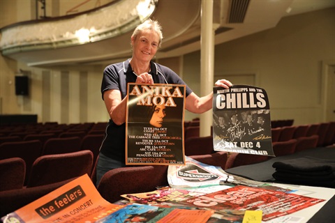Elly Dunkley with posters donated to the Archive