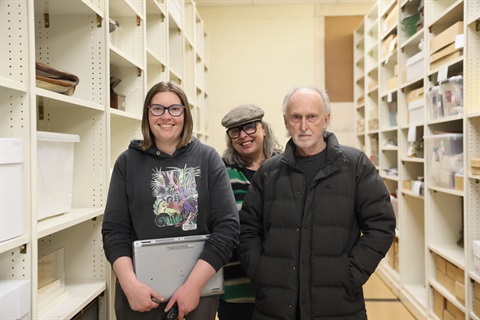 Credit: Chloe Searle with Areta Wilkinson and Mark Adams in the collection store of Waitaki Museum & Archive Te Whare Taoka o Waitaki, 2026
